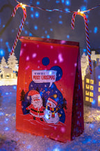 Torba papierowa świąteczna 16x8x27cm MIKOŁAJ I BAŁWAN Winners Gadzety
